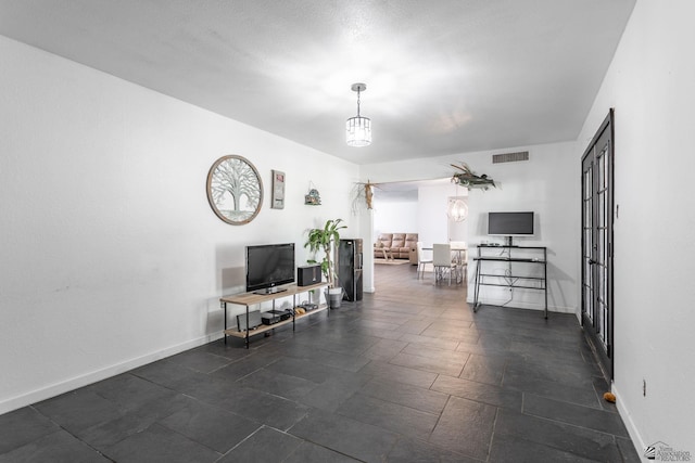 interior space featuring visible vents and baseboards