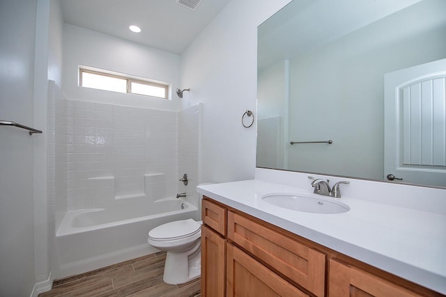 full bathroom featuring vanity, shower / bathing tub combination, and toilet