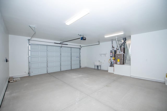 garage with sink, a garage door opener, and water heater