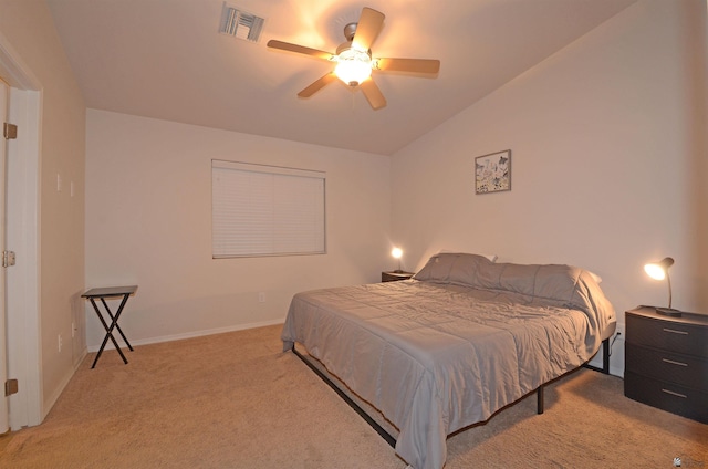 bedroom featuring a ceiling fan, light colored carpet, visible vents, and baseboards