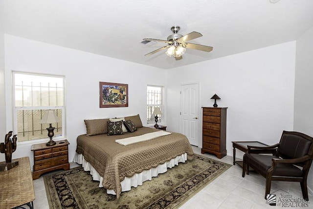 bedroom featuring ceiling fan