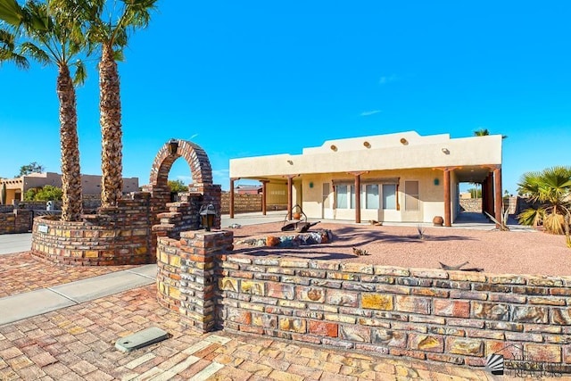 rear view of house featuring a patio area