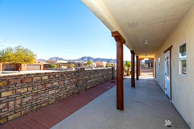 view of patio featuring a mountain view