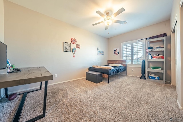 bedroom with ceiling fan and carpet floors