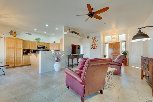 living room with recessed lighting, visible vents, ceiling fan, and light tile patterned floors