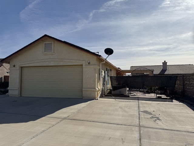 view of home's exterior with a garage