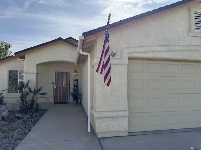 entrance to property with a garage