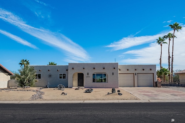 adobe home with a garage