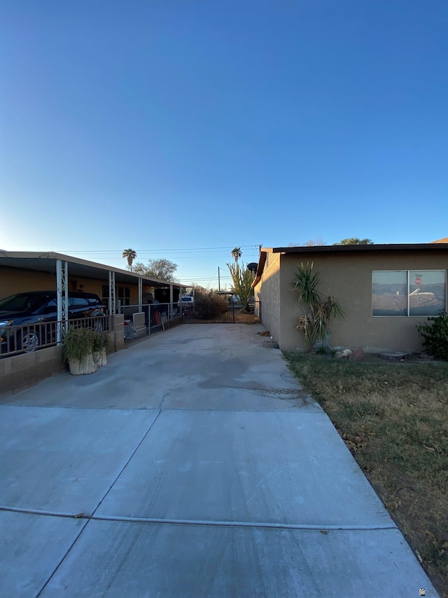 exterior space featuring a carport