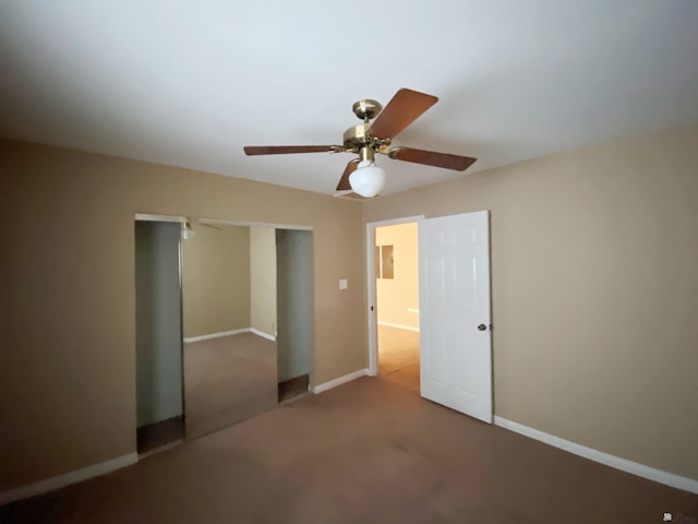 unfurnished bedroom featuring carpet flooring, a closet, and ceiling fan