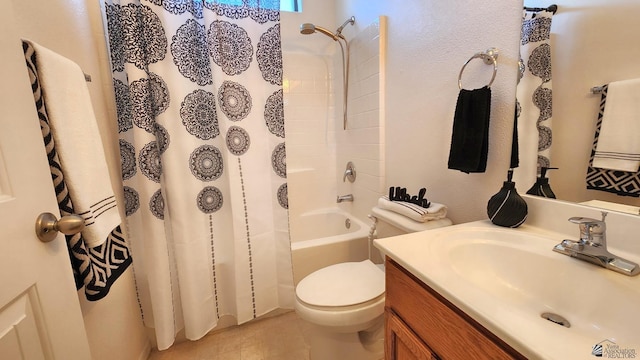 bathroom with toilet, shower / bath combo with shower curtain, and vanity