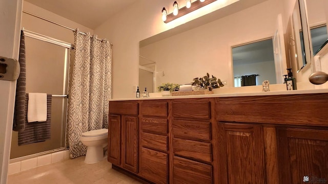 bathroom with double vanity, curtained shower, and toilet