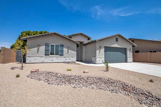 single story home with a garage