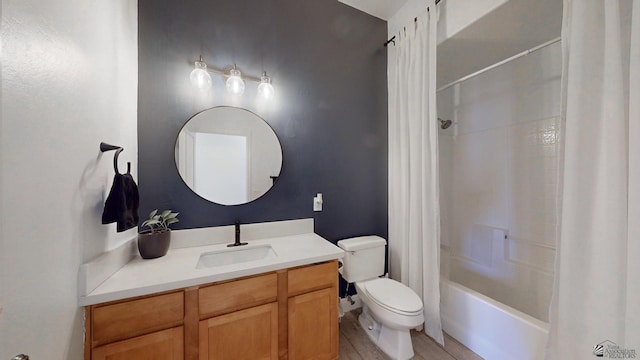 full bath featuring shower / tub combo with curtain, vanity, and toilet