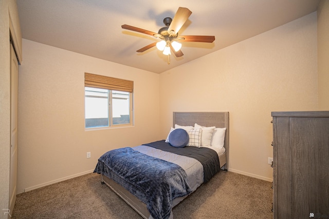 bedroom with ceiling fan, baseboards, and carpet