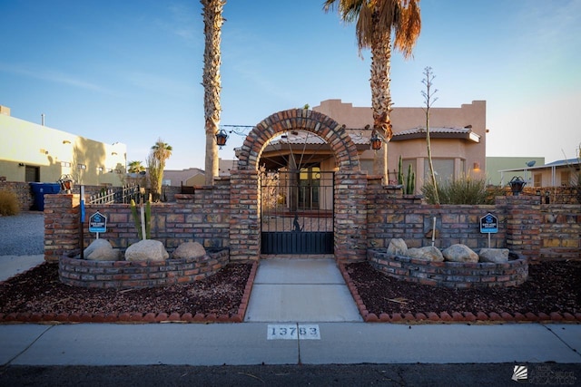 view of pueblo revival-style home