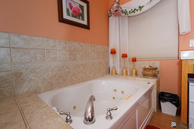 bathroom featuring a tub and vanity