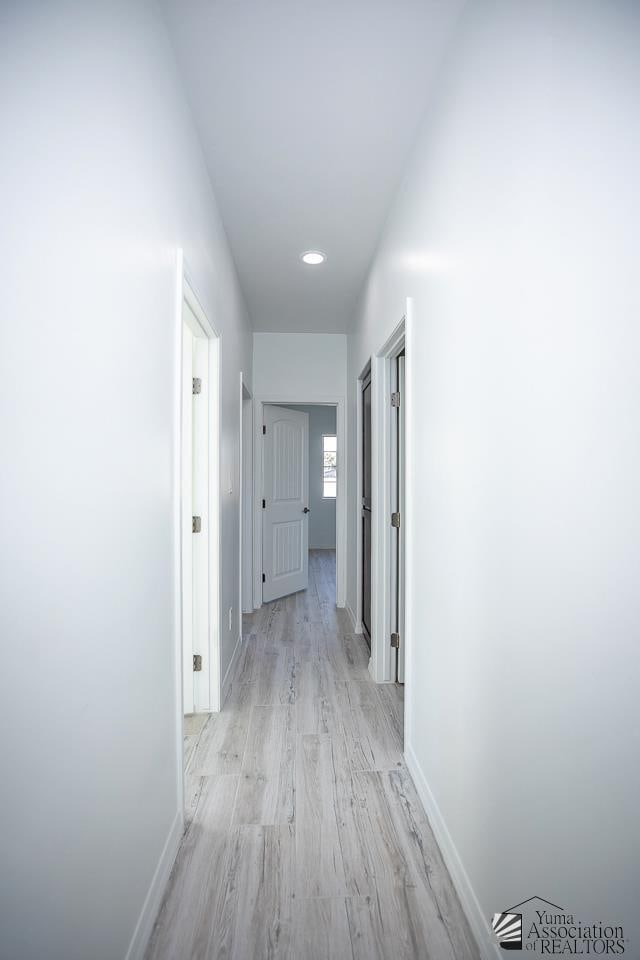 hall featuring light wood-type flooring