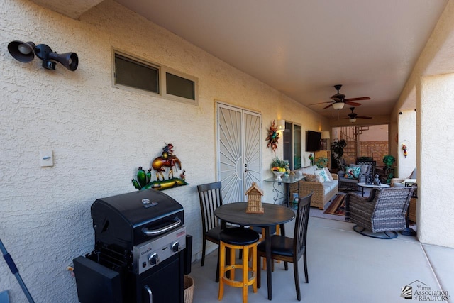 view of patio / terrace featuring ceiling fan and outdoor lounge area