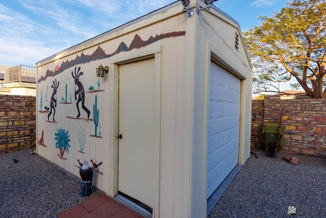 view of outbuilding featuring a garage