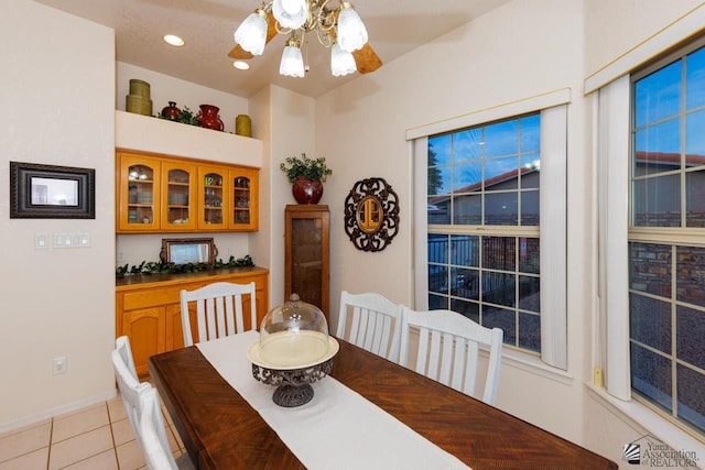 dining space with light tile patterned flooring