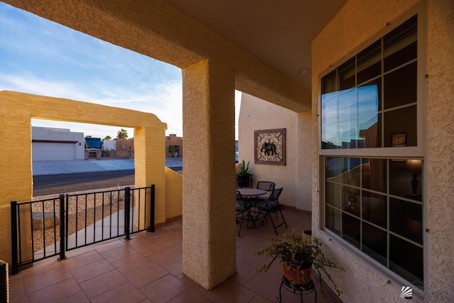 view of patio / terrace with a balcony