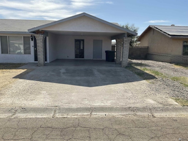 view of front of house featuring a carport