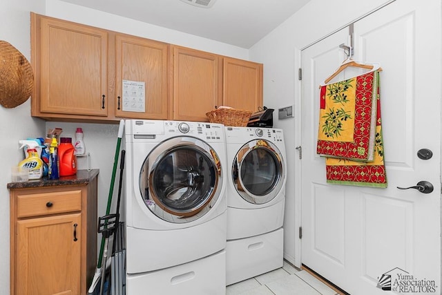 10243 Fairway Loop, Yuma, AZ 85367 - clothes washing area featuring cabinet space, washer and dryer, and light tile patterned flooring