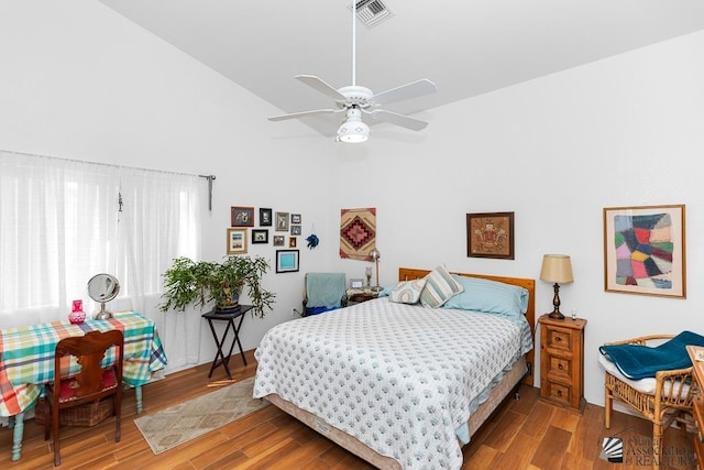 10243 Fairway Loop, Yuma, AZ 85367 - bedroom featuring wood finished floors, ceiling fan, and high vaulted ceiling