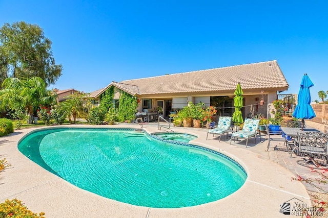 10243 Fairway Loop, Yuma, AZ 85367 - view of swimming pool featuring a patio area and a pool with connected hot tub