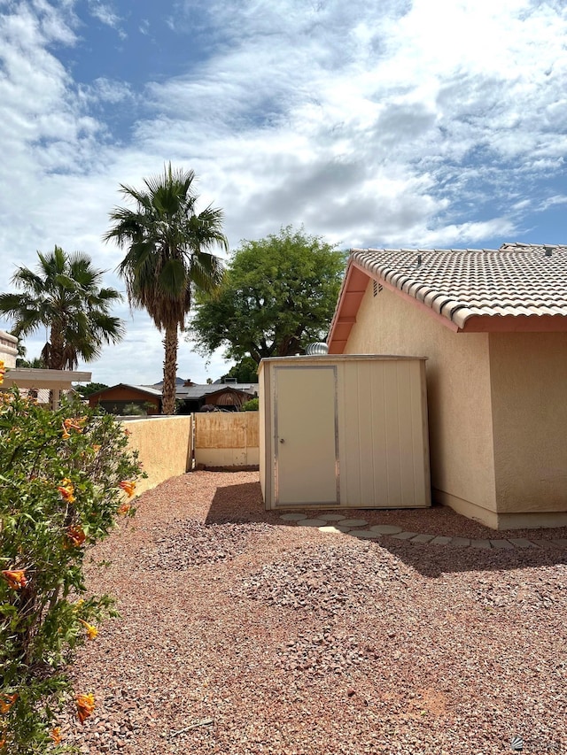 12385 E Del Rico, Yuma, AZ 85367 - view of yard with an outbuilding, fence, and a storage unit