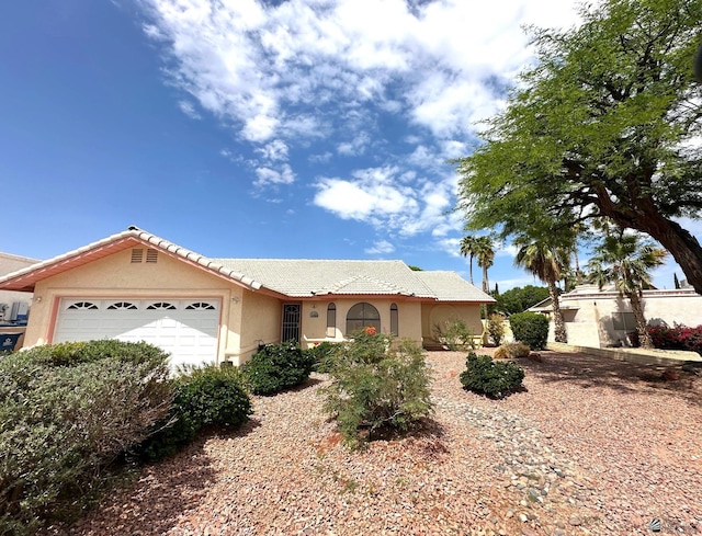 12385 E Del Rico, Yuma, AZ 85367 - view of front of home with stucco siding, a garage, and a tile roof