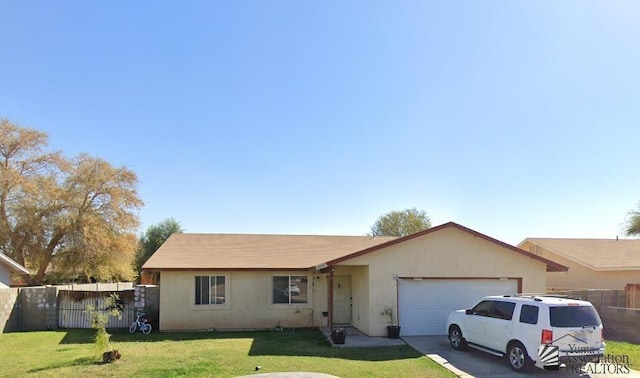 single story home with fence, a front lawn, concrete driveway, an attached garage, and stucco siding