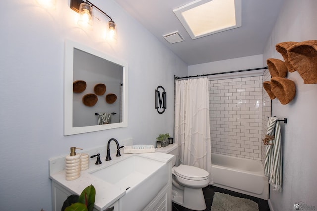 660 E 26th St, Yuma, AZ 85365 - bathroom featuring vanity, tile patterned floors, toilet, and shower / bath combination with curtain