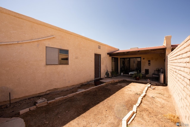 660 E 26th St, Yuma, AZ 85365 - rear view of property featuring a patio area and stucco siding