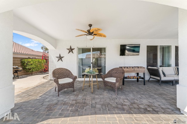 view of patio with a ceiling fan