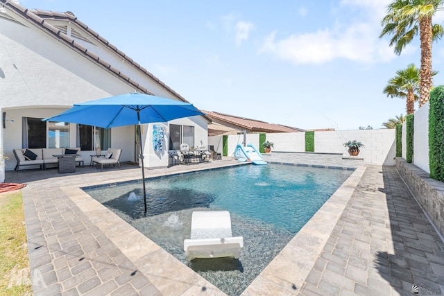 view of pool featuring a fenced backyard, a fenced in pool, an outdoor hangout area, and a patio area