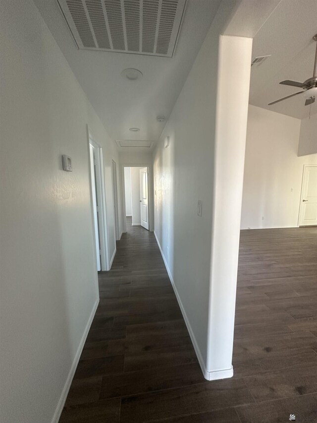 10864 E 45th St, Yuma, AZ 85367 - hallway featuring dark wood-style floors and baseboards