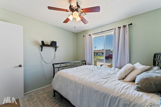 6248 E 42nd Ln, Yuma, AZ 85365 - carpeted bedroom featuring a textured ceiling and a ceiling fan