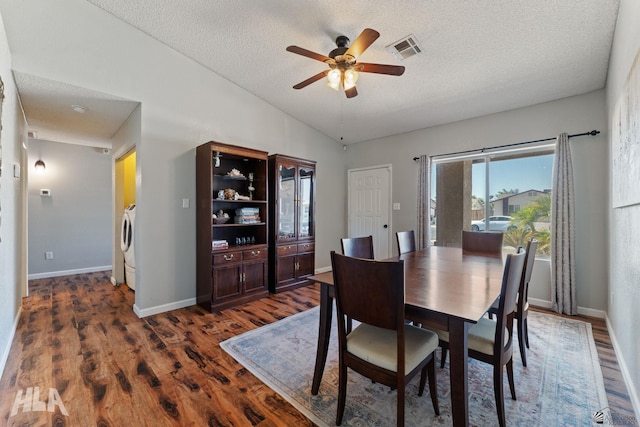 6248 E 42nd Ln, Yuma, AZ 85365 - dining area with a textured ceiling, ceiling fan, dark wood-style flooring, lofted ceiling, and washing machine and clothes dryer