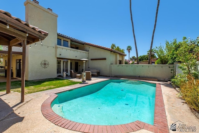 view of pool featuring a patio, a fenced backyard, an outdoor living space, and a fenced in pool