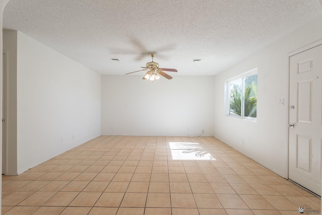 1086 S Arena Dr, Yuma, AZ 85364 - unfurnished room with ceiling fan and a textured ceiling