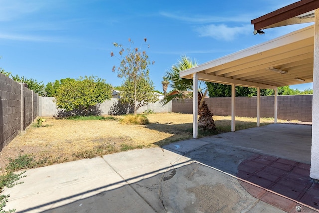 1086 S Arena Dr, Yuma, AZ 85364 - fenced backyard featuring a patio area