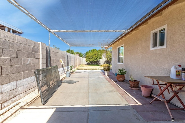 1086 S Arena Dr, Yuma, AZ 85364 - fenced backyard featuring a patio