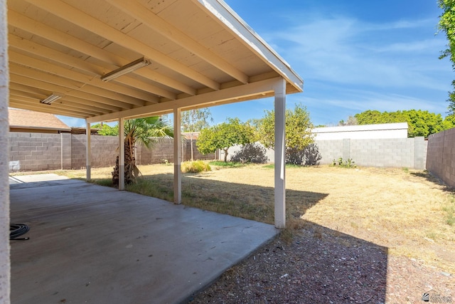 1086 S Arena Dr, Yuma, AZ 85364 - fenced backyard featuring a patio area
