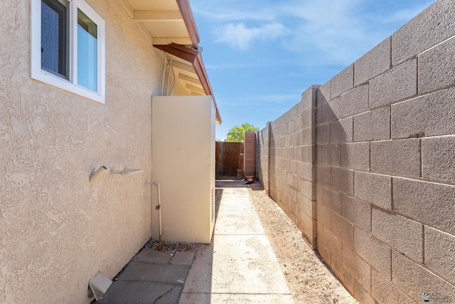 1086 S Arena Dr, Yuma, AZ 85364 - view of property exterior with stucco siding and a fenced backyard