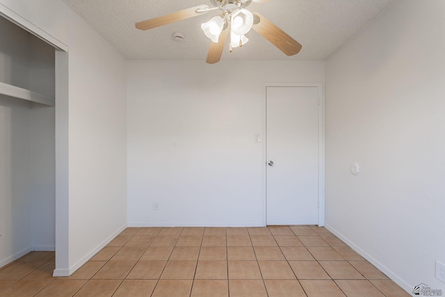 1086 S Arena Dr, Yuma, AZ 85364 - spare room with ceiling fan, a smoke detector, a textured ceiling, and light tile patterned floors