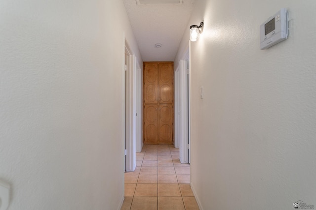 1086 S Arena Dr, Yuma, AZ 85364 - hall featuring light tile patterned floors and baseboards