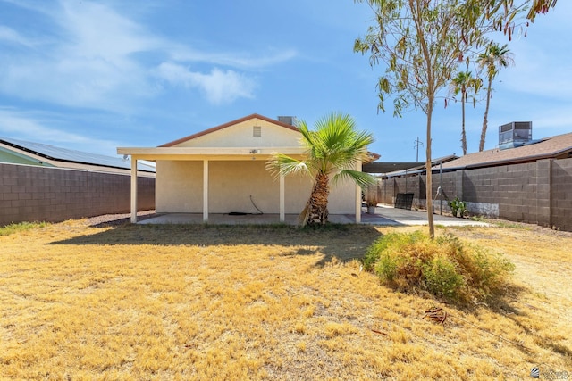 1086 S Arena Dr, Yuma, AZ 85364 - rear view of property featuring a patio, a fenced backyard, and stucco siding