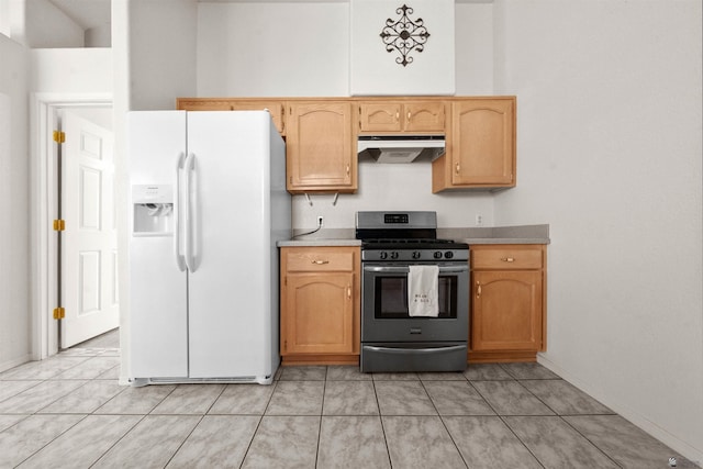 11595 S Prescott Ave, Yuma, AZ 85365 - kitchen with white refrigerator with ice dispenser, gas stove, under cabinet range hood, and light tile patterned flooring